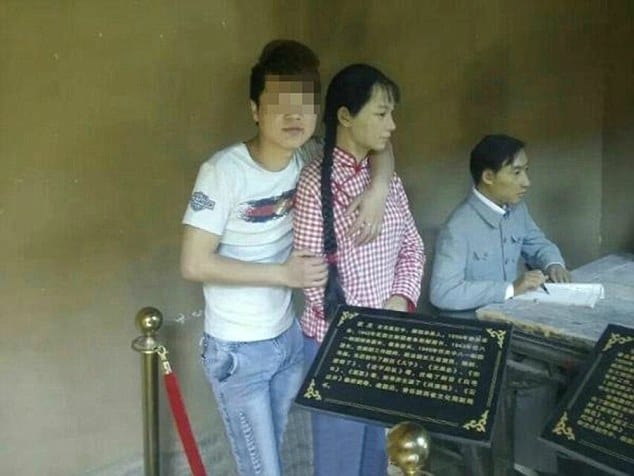 Pic shows: Male tourist kissing a wax figure at a revolutionary memorial site. A male tourist has been slated by Chinese media after he was seen kissing and fondling a wax figure at a famous memorial site. The unidentified man was travelling with a tour group to the Malan revolutionary memorial in Xunyi County of north-west Chinas Shaanxi Province, where the Chinese Revolution has been enshrined in the form of several wax displays. Netizens were angered by the young man, who stepped into the display area with the wax figures even though it was off limits, and was then seen hugging and kissing a figure of a woman whose breasts he also fondled. The man had his photographs taken while fondling the wax figure, which caused anger amongst netizens who have been calling for his arrest, and for authorities stamp to do more to stamp out uncivilised behaviour by tourists. Another young man was blacklisted from scenic areas in China after he took a photo of himself sitting on top of a Red Army statue. Now netizens are hoping for similarly harsh punishment for the wax breast fondling tourist. Several days ago the China National Tourism Administration released its blacklist for misbehaving tourists in a bid to curb inappropriate behaviour by naming and shaming those banned from visiting touristic treasures. (ends)